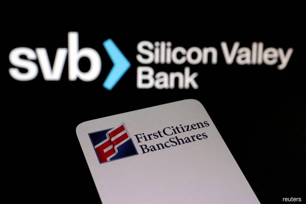 First Citizens BancShares and SVB (Silicon Valley Bank) logos are seen in this illustration taken March 19, 2023. (Reuters pic)